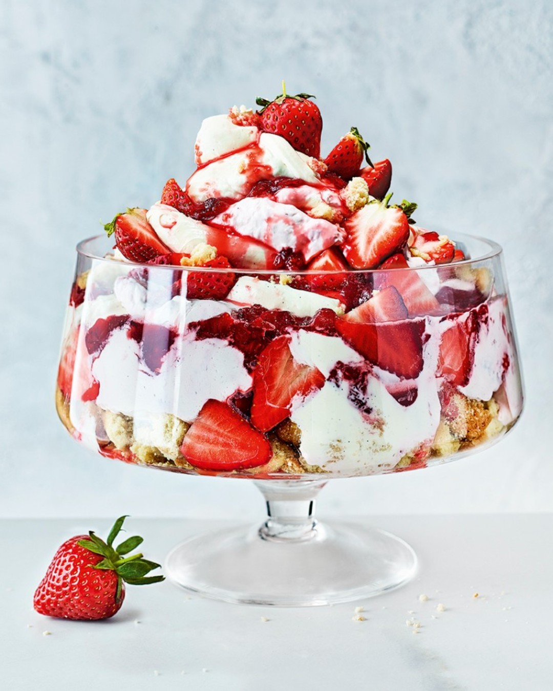 Strawberry and cream trifle in a glass bowl